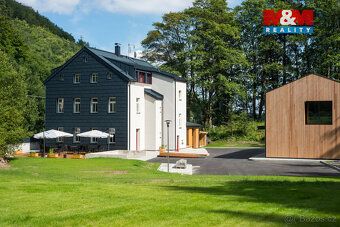 In mountain resort Pstruží there is an apartment house AP19 waiting for you