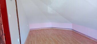For sale is a brick house for rent by rows located in the city center where all civic amenities are available.