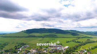 Sunny building plot of 2428 m² overlooking Ještěd, just 3 minutes from Liberec