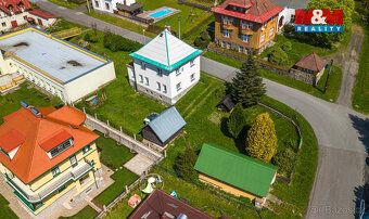 Nabízíme k prodeji rodinný dům o dispozici 5+1 v atraktivní 
