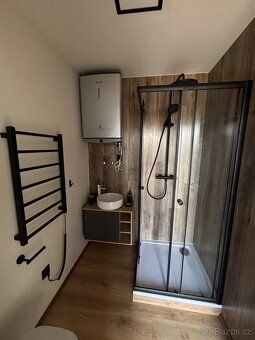 I am offering for sale a stylish, technologically advanced wooden house