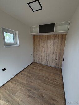 I am offering for sale a stylish, technologically advanced wooden house