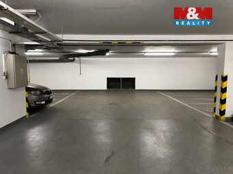 Nabízíme k pronájmu soukromé garážové stání v moderním bytov