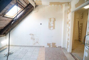 We offer for sale a property in Litvínov that is formed by merging two terraced family houses.