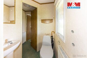 We offer for sale an insulated, year-round habitable mobile home