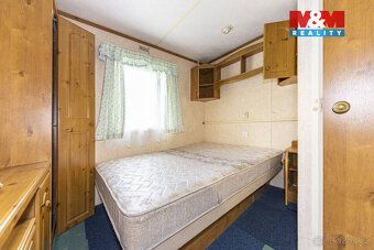 We offer for sale an insulated, year-round habitable mobile home