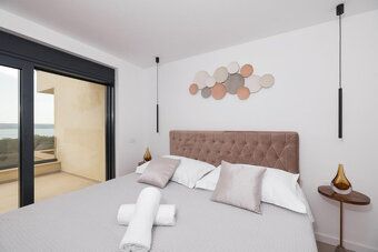 LaHoREAL offers for sale a new modern villa with pool and sea view in Maslenica