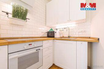 Prodej prostorného bytu 3+kk o užitné ploše 86 m² v klidné č