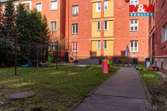 Prodej bytu 1+1 o užitné ploše 46 m² v cihlovém domě v širší