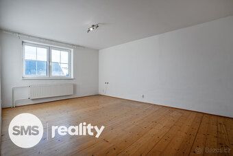 Jedna nemovitost, mnoho možností. Prostorný cihlový dům s ví