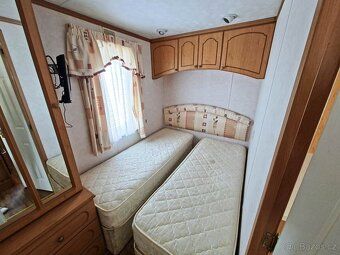 Pěkný celoroční dům dovezený z Anglie . Dvojskla v oknech a 