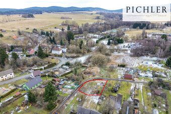 Looking for a building plot near the village center with an access road?
