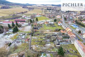 Looking for a building plot near the village center with an access road?
