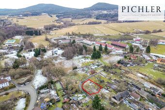 Looking for a building plot near the village center with an access road?