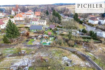 Looking for a building plot near the village center with an access road?