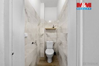 Nabízíme dům se třemi byty 2+1 a pozemky o výměře 1324 m2 v 