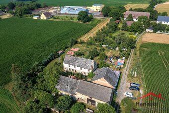 We offer for sale an interest in a family house and land plots in Ju