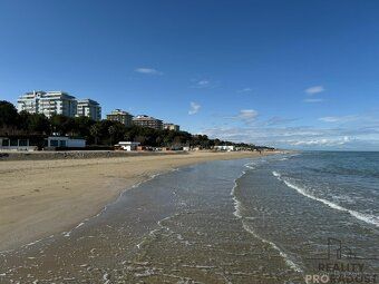 Spacious apartment with terrace just steps away from sandy beach.