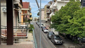 Spacious apartment with terrace just steps away from sandy beach.