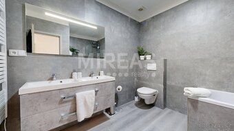 Nabízíme Vám moderní mezonetový byt 3+kk 70 m² se zahrádkou 