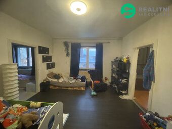 Dům s byty a jedním nebytovým prostorem,nedaleko Zámečku v s