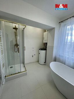 Prodej světlého bytu 3+kk o užitné ploše 75 m² v cihlovém do