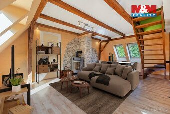 Nabízíme k prodeji slunný mezonetový byt 4+kk o ploše 96 m² 