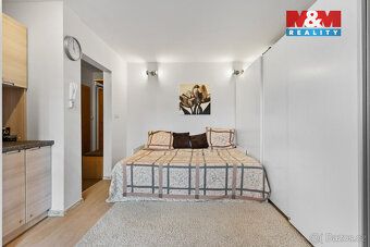Nabízíme k prodeji krásný prakticky řešený podkrovní byt 2+k