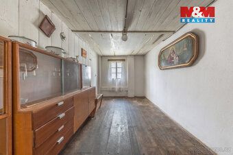 Nabízíme k prodeji chalupu vzniklou propojením původní roube
