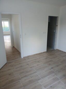 Prodám novostavbu,obytná plocha 55m2 + pozemek 130 m2. Možno