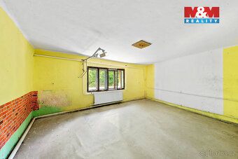 Nabízíme k prodeji prostorný rodinný dům v klidné části obce