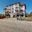 Prodej prostorného bytu 3+1 se dvěma balkony, garáží a zahra