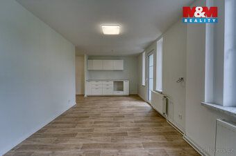 Nabízíme k prodeji bytový dům se stavebním pozemkem v atrakt