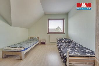 Nabízíme k prodeji prostorný rodinný dům v klidné části obce