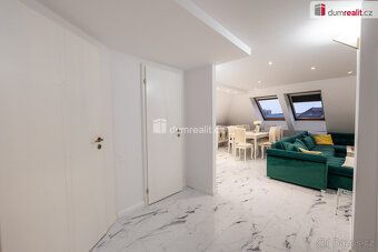 , prodej mezonetového bytu 5 + KK, 130 m² podlahové plochy a