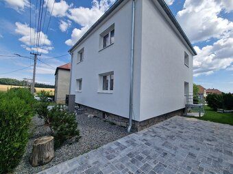 Pronájem nového bytu 3+kk se zahradou, 2 parkovacími místy a