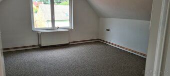 Dvougenerační rodinný dům o velikosti 7 + 2 a rozloze 180 m2