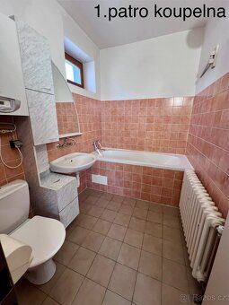 Prostorný rodinný dům 5+1 se zahradou, garáží a potenciálem 