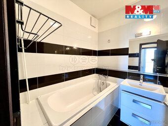 Prodej prostorného bytu 4+kk o užitné ploše 90 m² v centru M