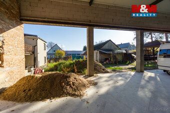 Nabízíme k prodeji prostorný rodinný dům v klidné části obce