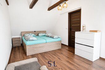 Ev.č. 01657 Nabízíme k pronájmu prostorný mezonetový byt 4+1