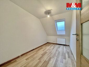 Nájemní dům o zastavěné ploše 94 m2, se nachází v klidné čás