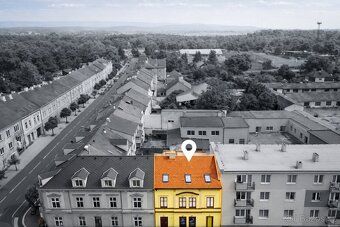 Dva domy, bytové prostory + prodejna + dvorek
Nabízím k prod