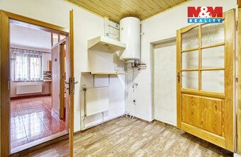 Nabízíme k prodeji prostorný řadový rodinný dům o užitné plo