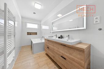 Nabízíme k prodeji moderní rodinný dům o dispozici 5+1 se za