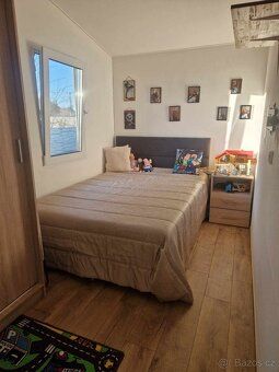 Rozměry 12x4,5m 2+kk Domek je poctivě zateplený okna trojskl