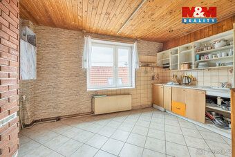 Nabízíme k prodeji samostatně stojící rodinný dům v centru K