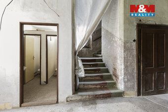 Prodej nájemního domu v centru Opočna, ulice Baštecká. Zděná