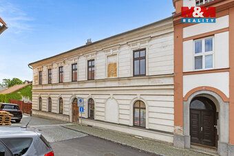 Prodej nájemního domu v centru Opočna, ulice Baštecká. Zděná