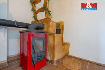 Útulná chata v klidném prostředí obklopeném zelení nabízí id